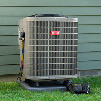 bryant-air-conditioner-in-side-yard