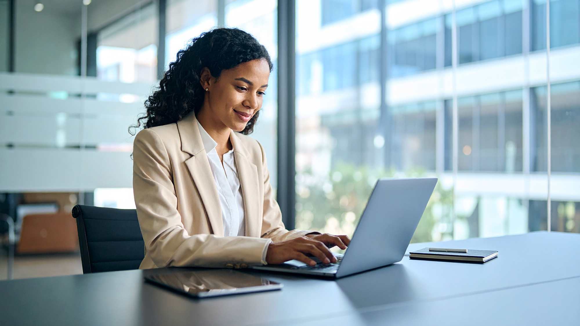 woman-using-computer-in-office-16x9