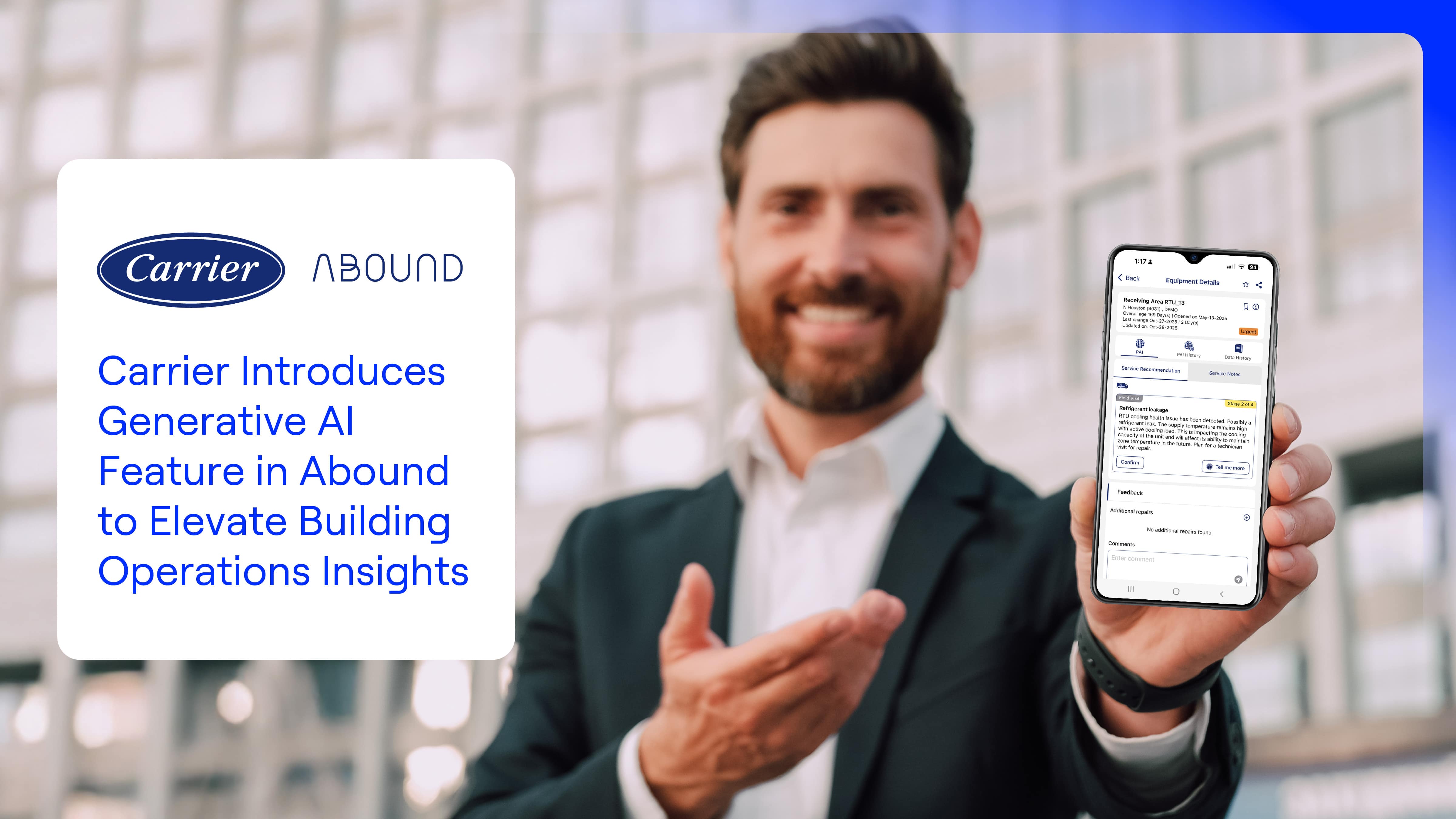 man-holding-mobile-phone-in-office-16x9