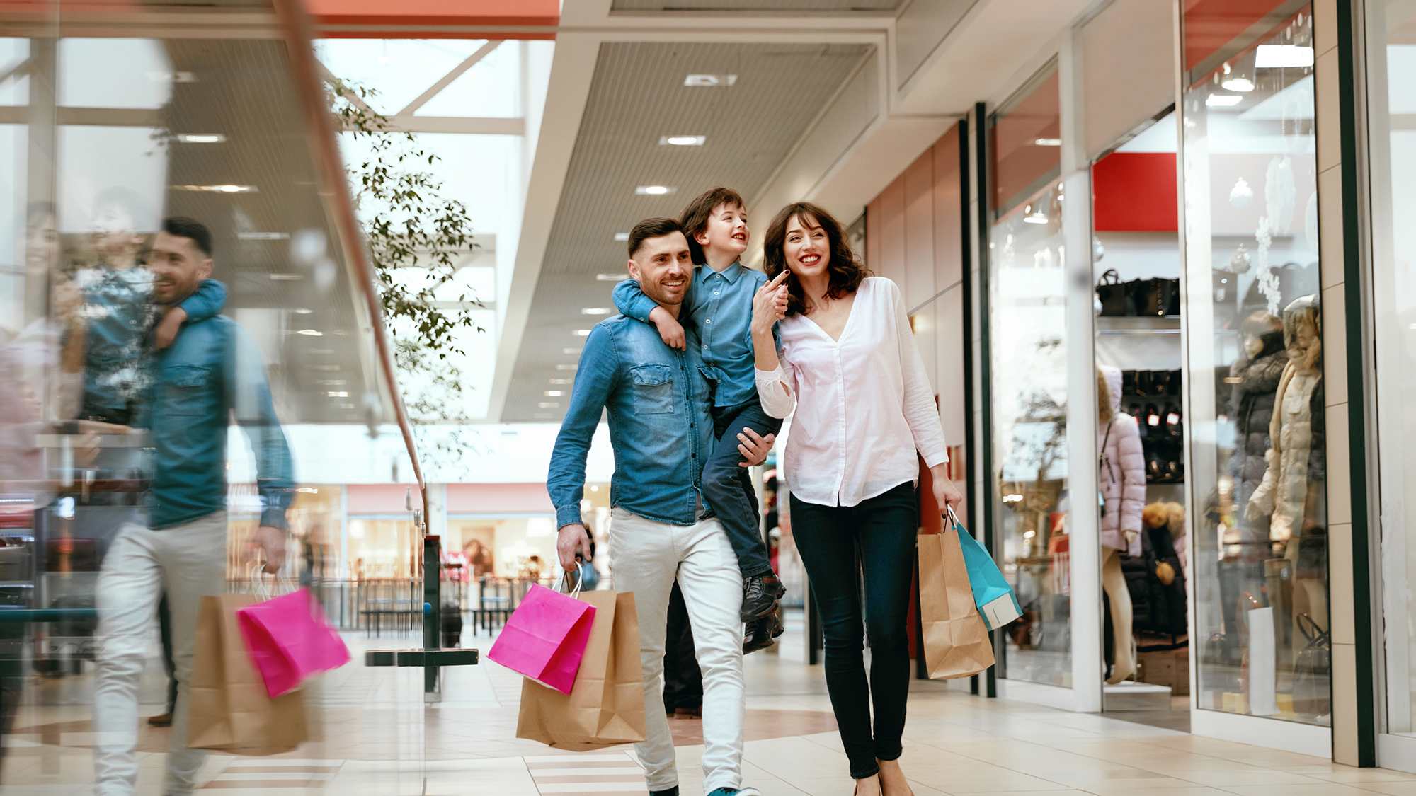 family-walking-in-mall-16x9