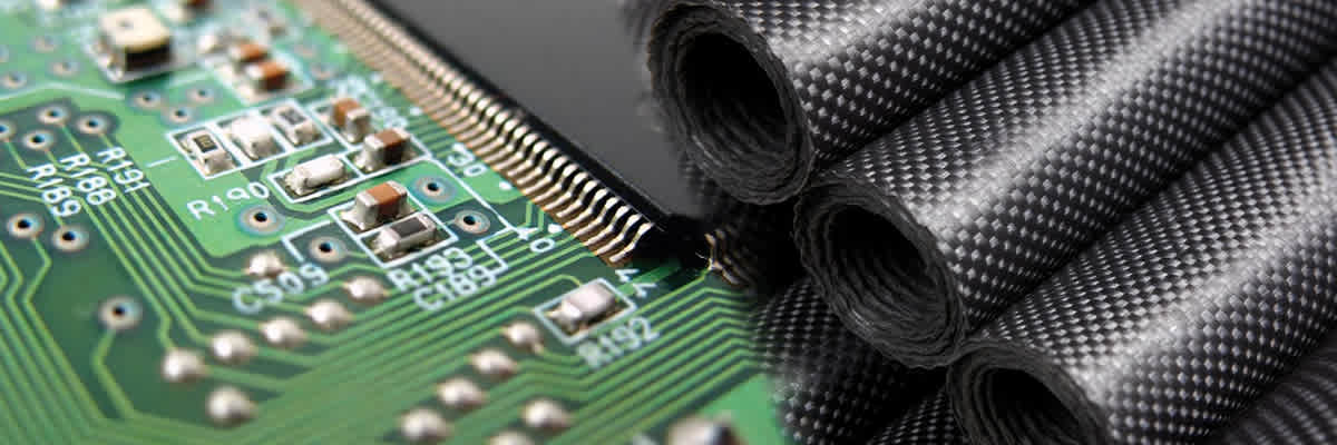 Computer Chip and Rolls of Carbon Fiber