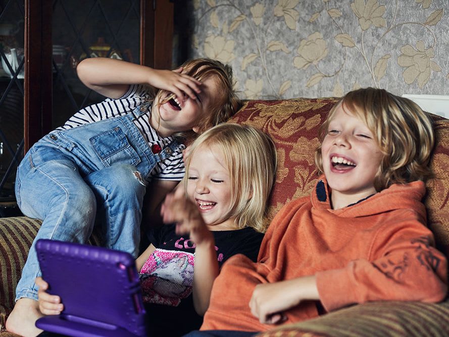 kids-laughing-couch_4-3