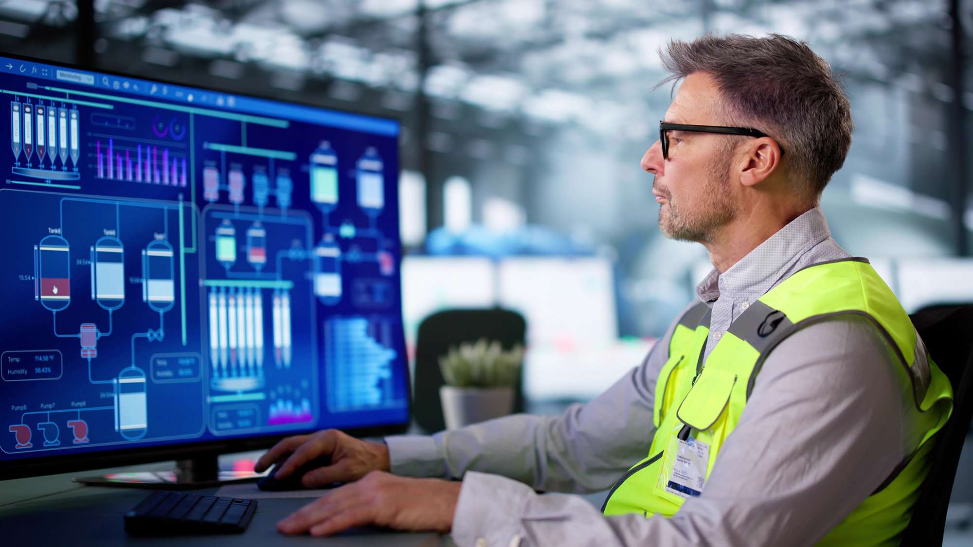 engineer-working-on-computer-in-commercial-building-16x9