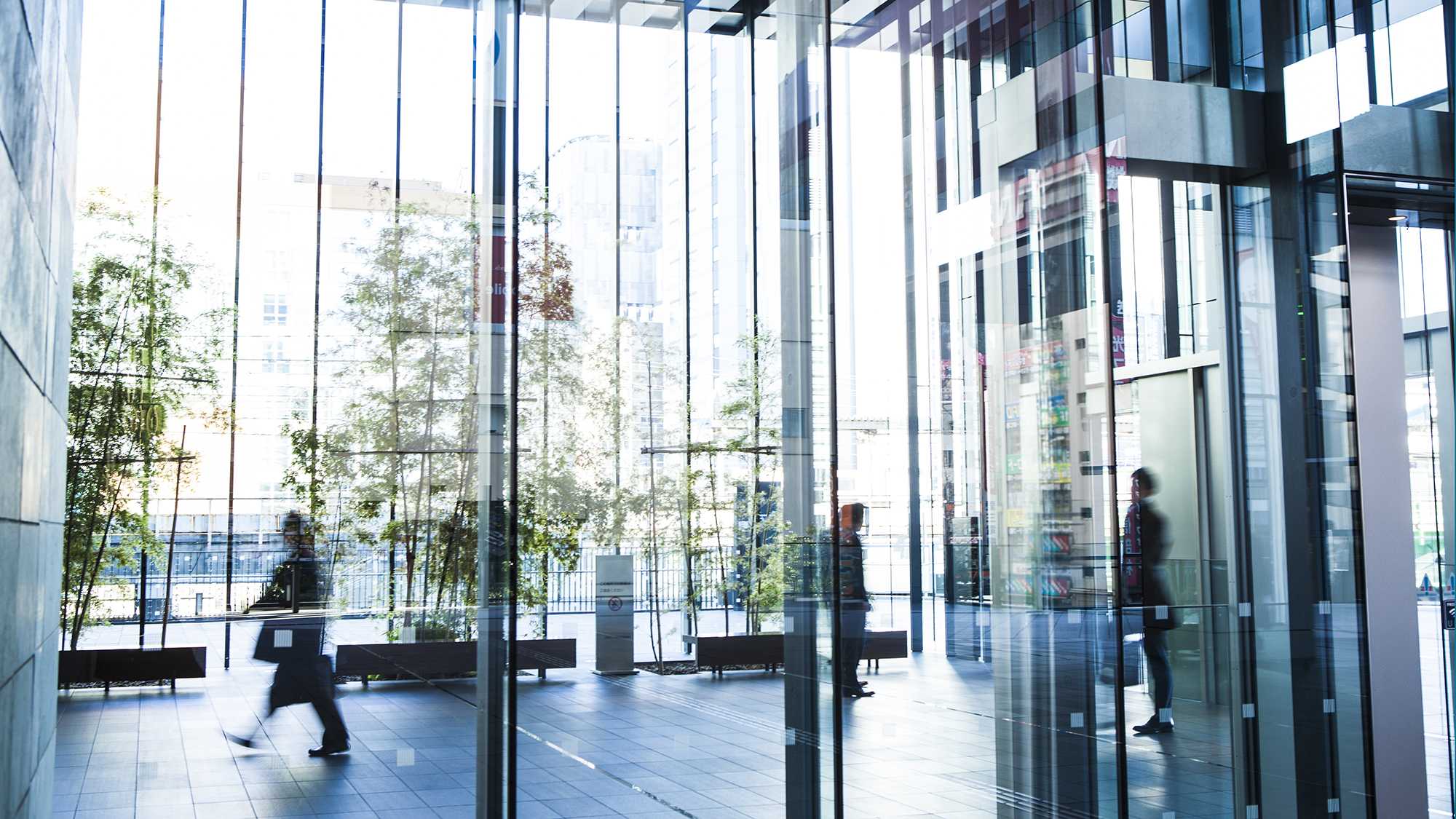 people-in-commercial-building-walkway-card