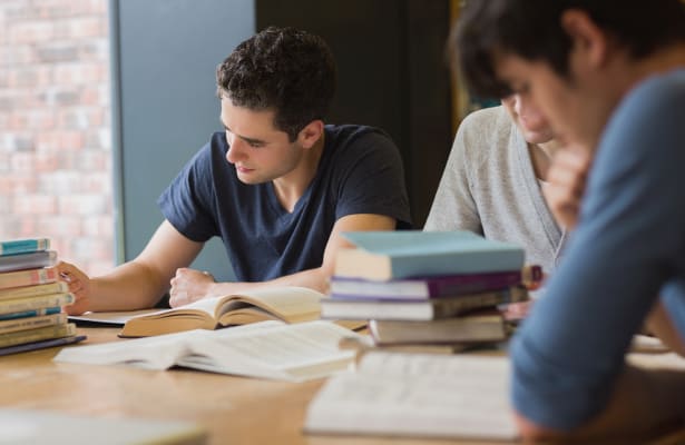 college-students-studying-library