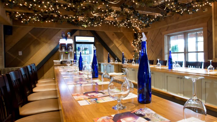 carrier-guest-tables-set-for-event-winery-interior