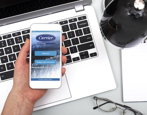 carrier-person-using-mobile-phone-at-desk
