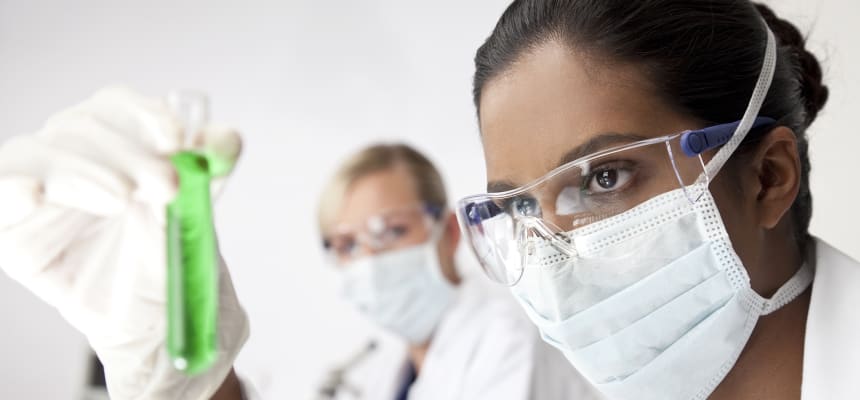 carrier-scientist-looking-at-matter-in-test-tube