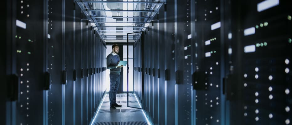 data-center-man-working-on-laptop