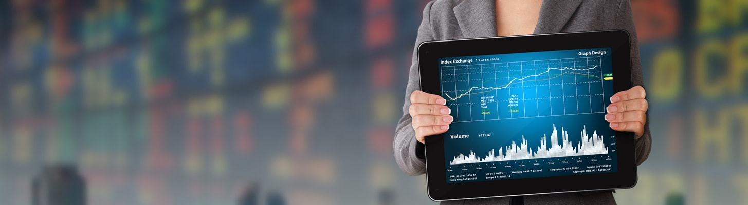 woman-holding-laptop-computer-stock-ticker_h