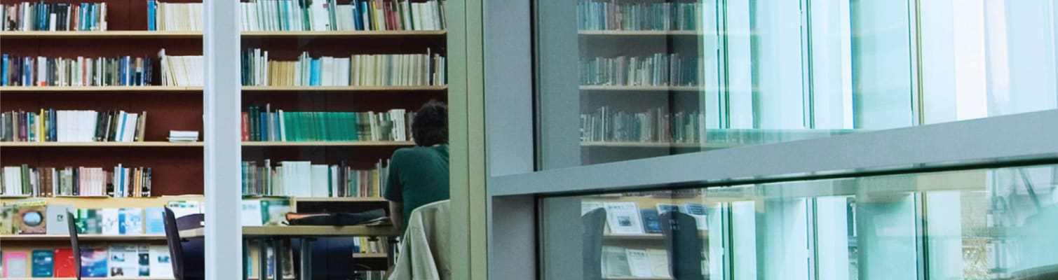 carrier-person-studying-in-library-wide