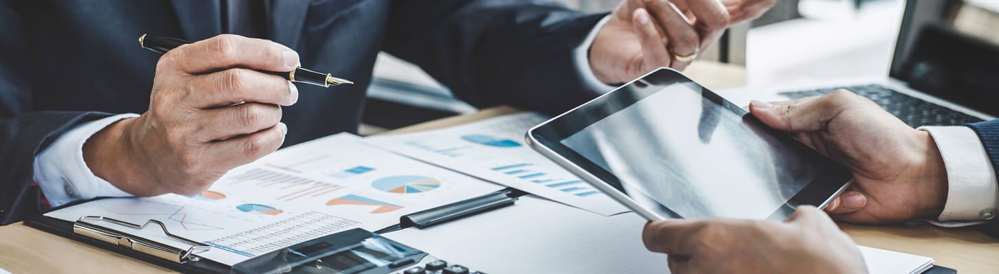two-men-discuss-financial-statements_h