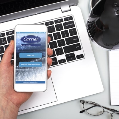 carrier-person-using-mobile-phone-at-desk-mobile