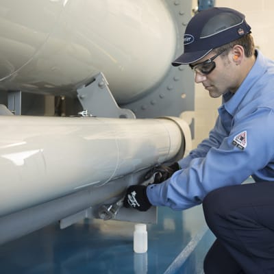 carrier-technician-testing-hvac-equipment-mobile
