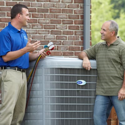 HVAC technician onsite for heat pump troubleshooting
