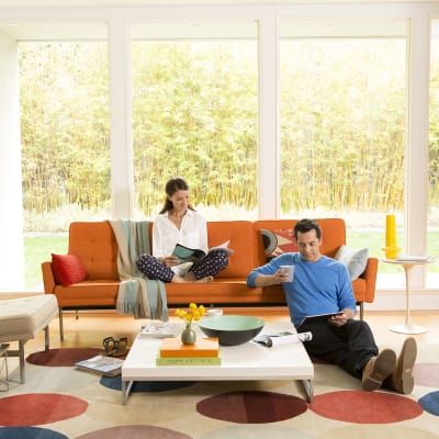 Couple in comfortable home with proper AC temperature set