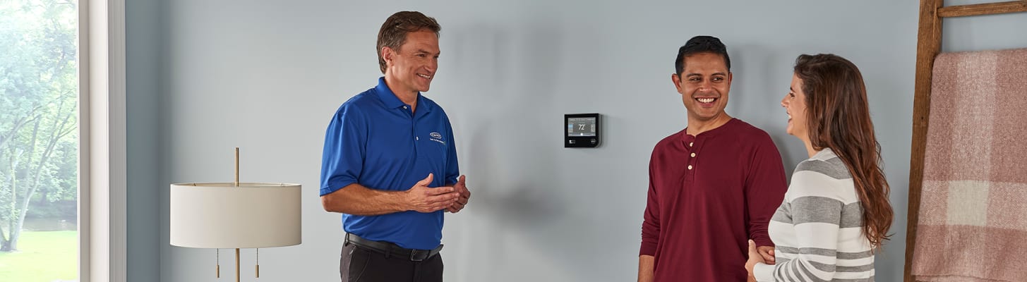dealer-talking-to-family-about-carrier-infinity-thermostat