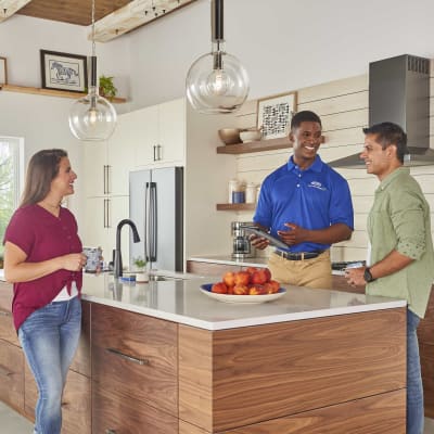 Carrier Dealer Discussing Central Air Conditioner Prices