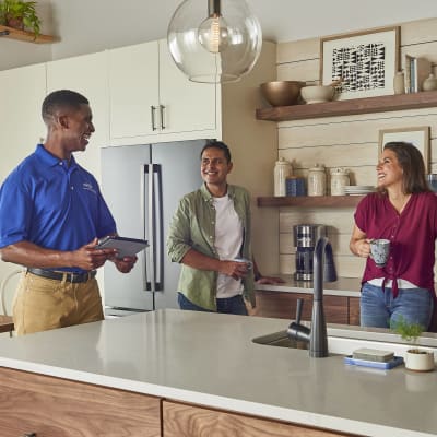Carrier Dealer discussing heat pump cost