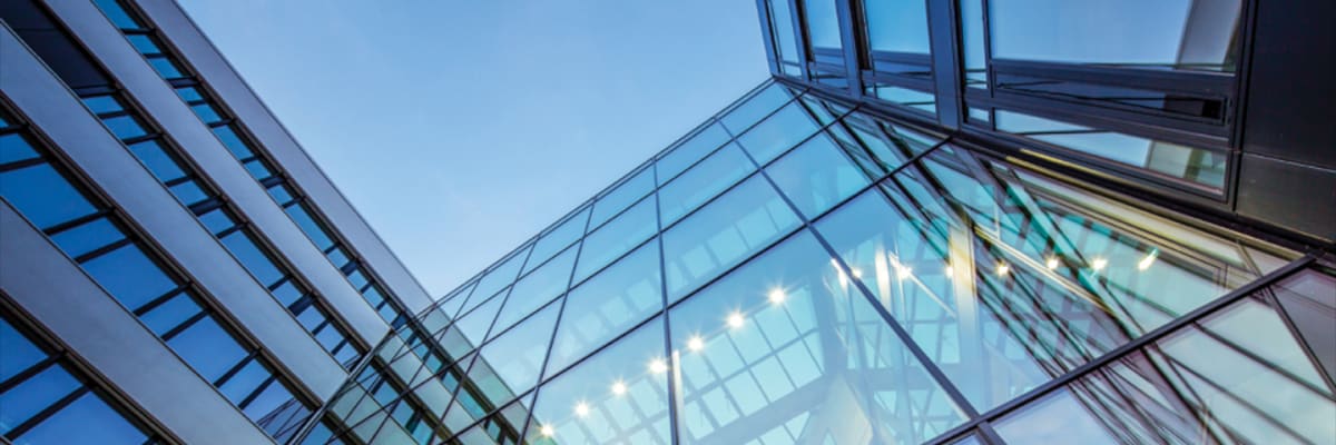 commercial-office-building-glass-facade-1440x480
