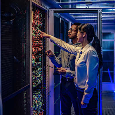 man-and-woman-in-a-data-center-sq