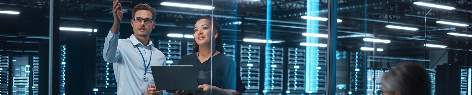 people-working-in-data-center-2000x400