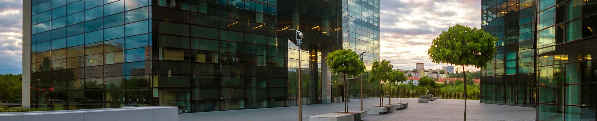 exterior-commercial-building-at-dusk-2000x400