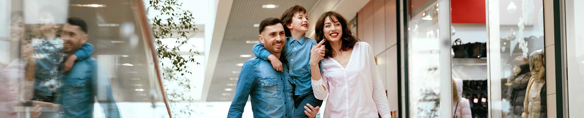 family-walking-in-mall-2000x400