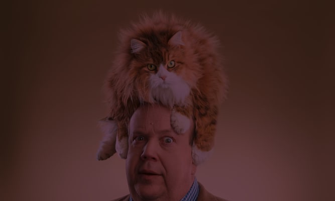 man-with-cat-on-his-head