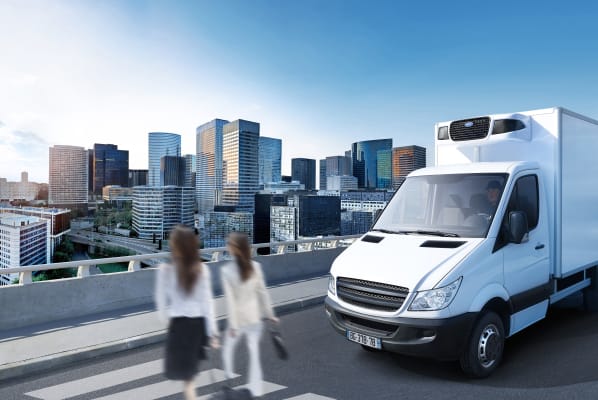lcv-on-road-women-crossing-street