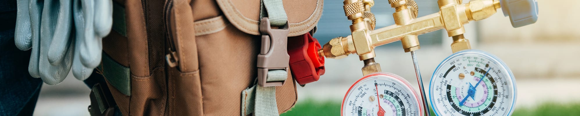 technician-holding-gauges-banner-image