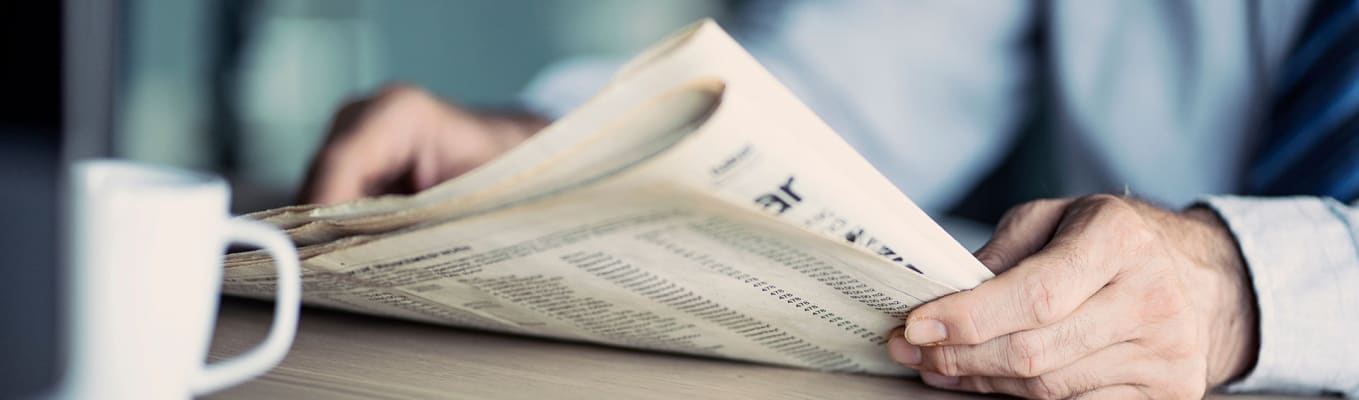 Man-reading-news-paper