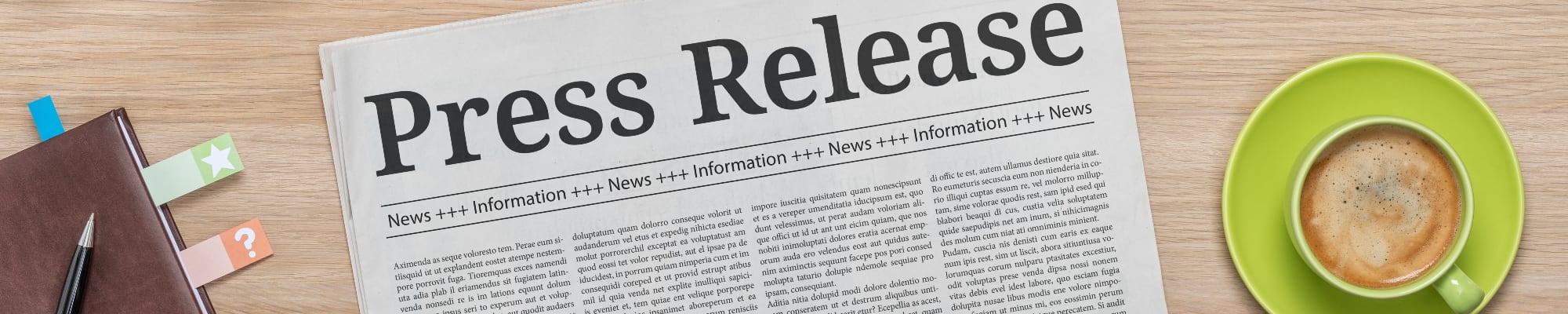 newspaper-on-desk-headline-press-release