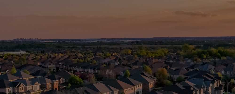 residential-neighborhood-aerial-view-with-open-sky-5x2