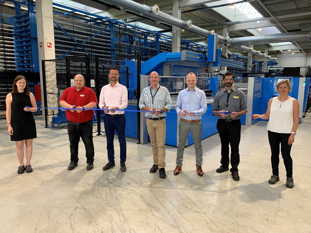 Rubbon cutting at Myto Factory