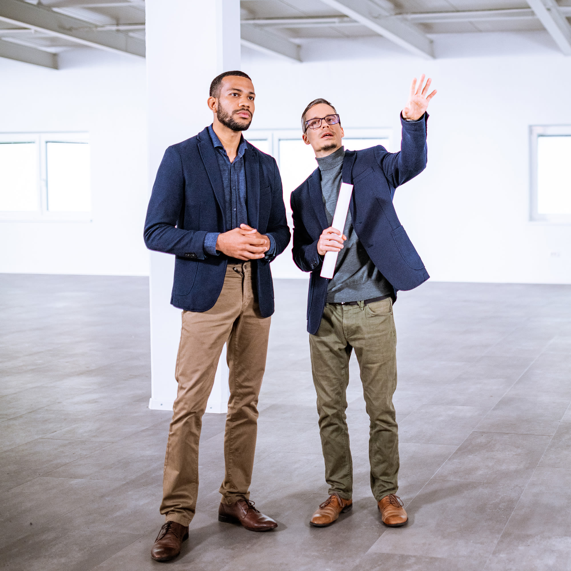 contractor-and-owner-discussing-building-space-1x1