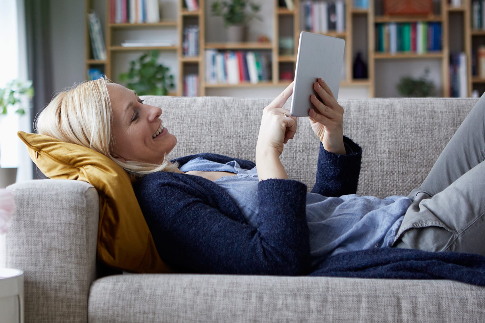 woman-relaxing-on-the-couch-in-her-healthy-home-3x2