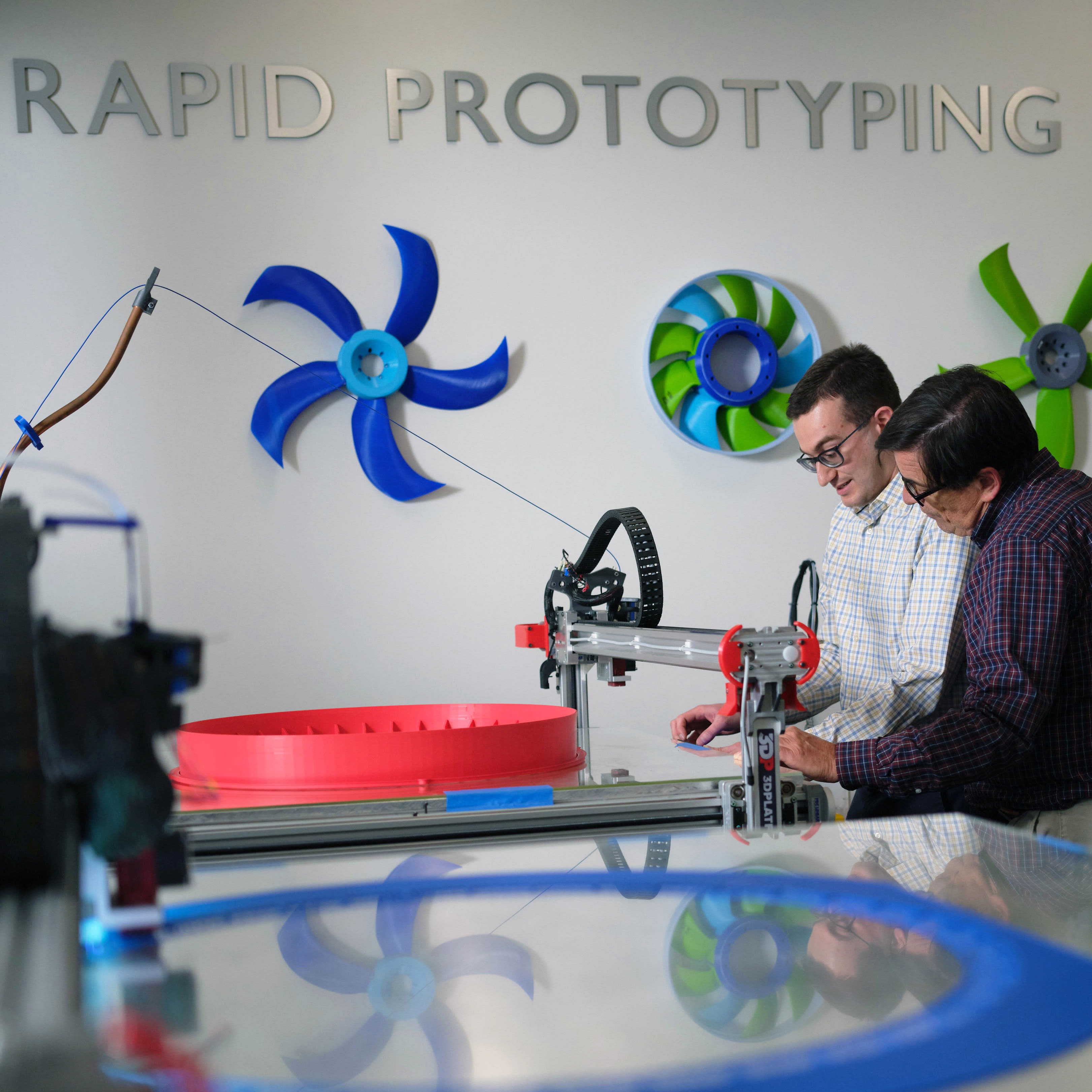 Carrier-Innovation-engineers-working-1x1