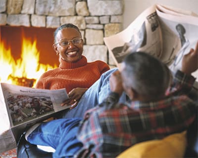 couple-reading-newspaper
