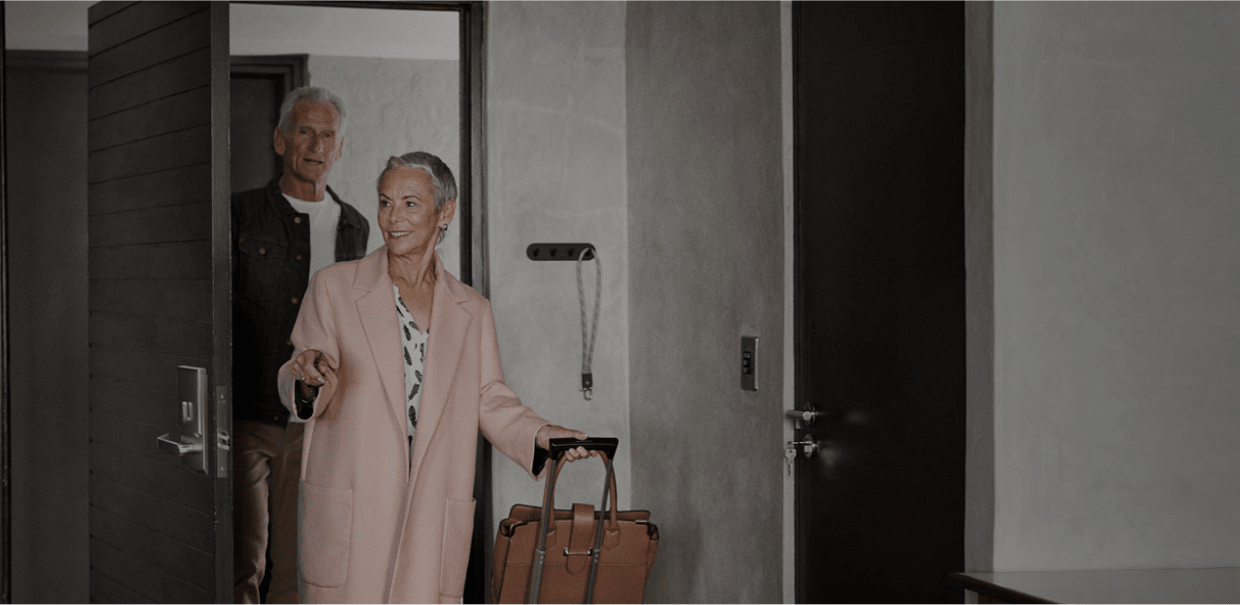 Onity-Trillium-lock-couple-entering-room-footer