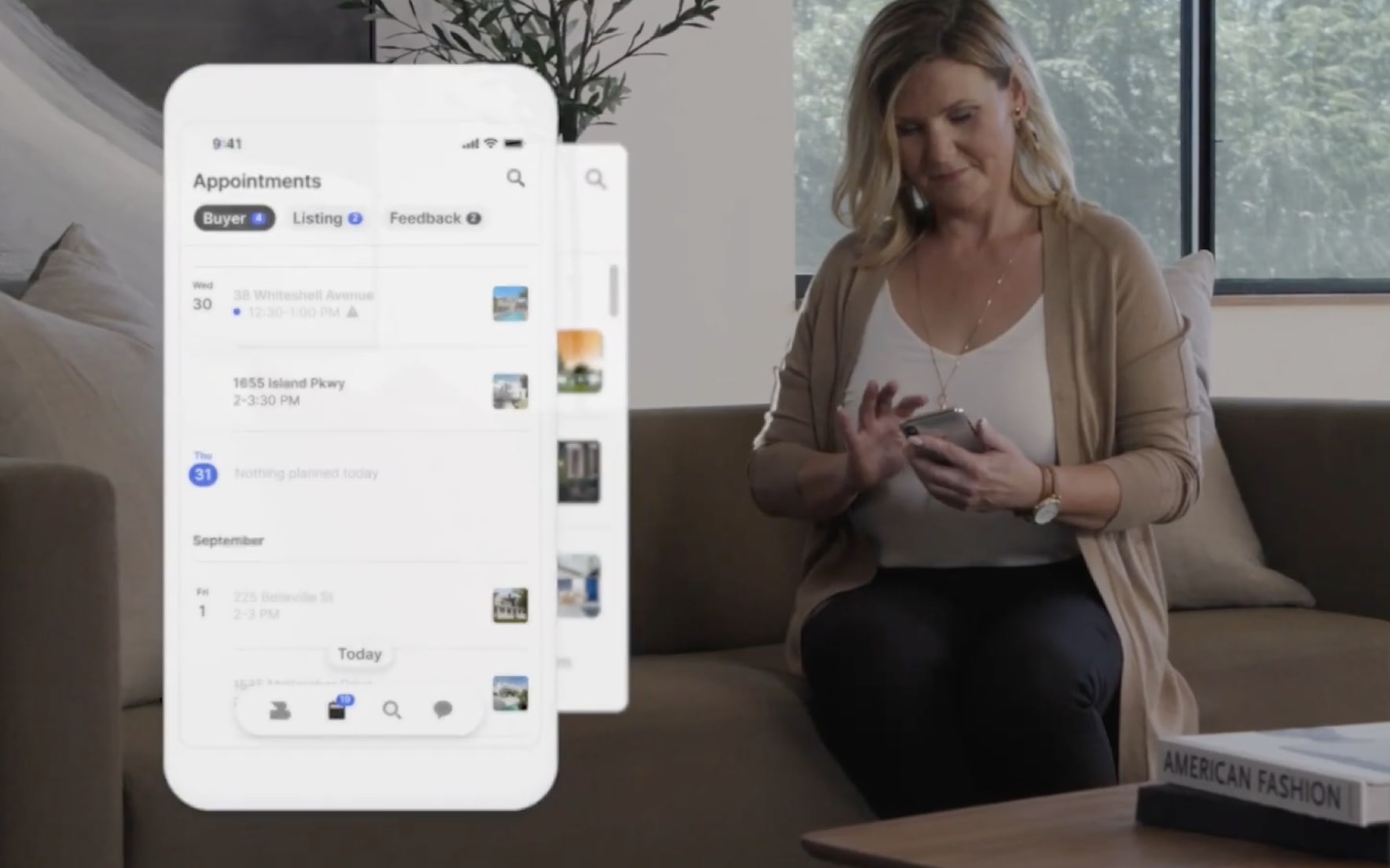 Close up of mobile app screen with an appointment calendar next to background scene of real estate agent sitting on sofa looking at mobile phone