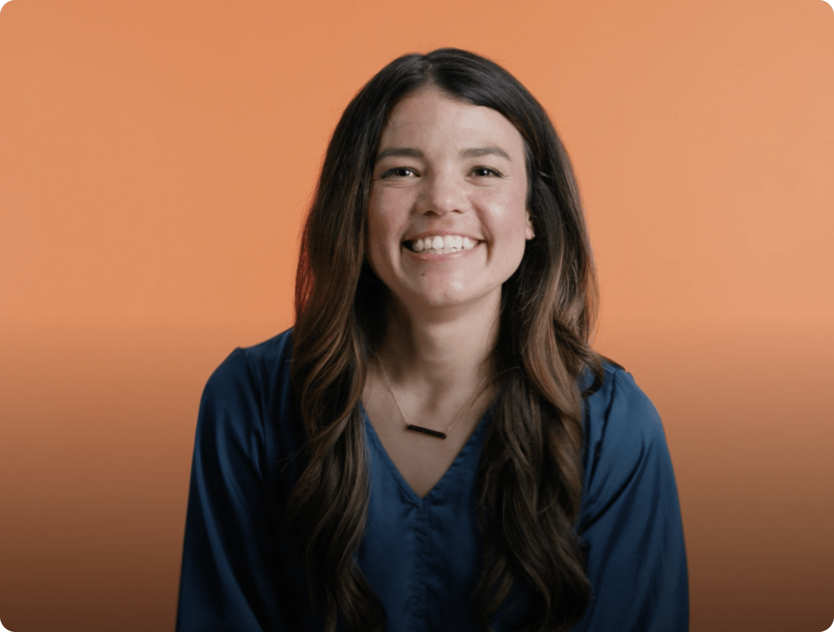 Close up of smiling real estate agent Felicia Mares with video caption knows who's coming and going