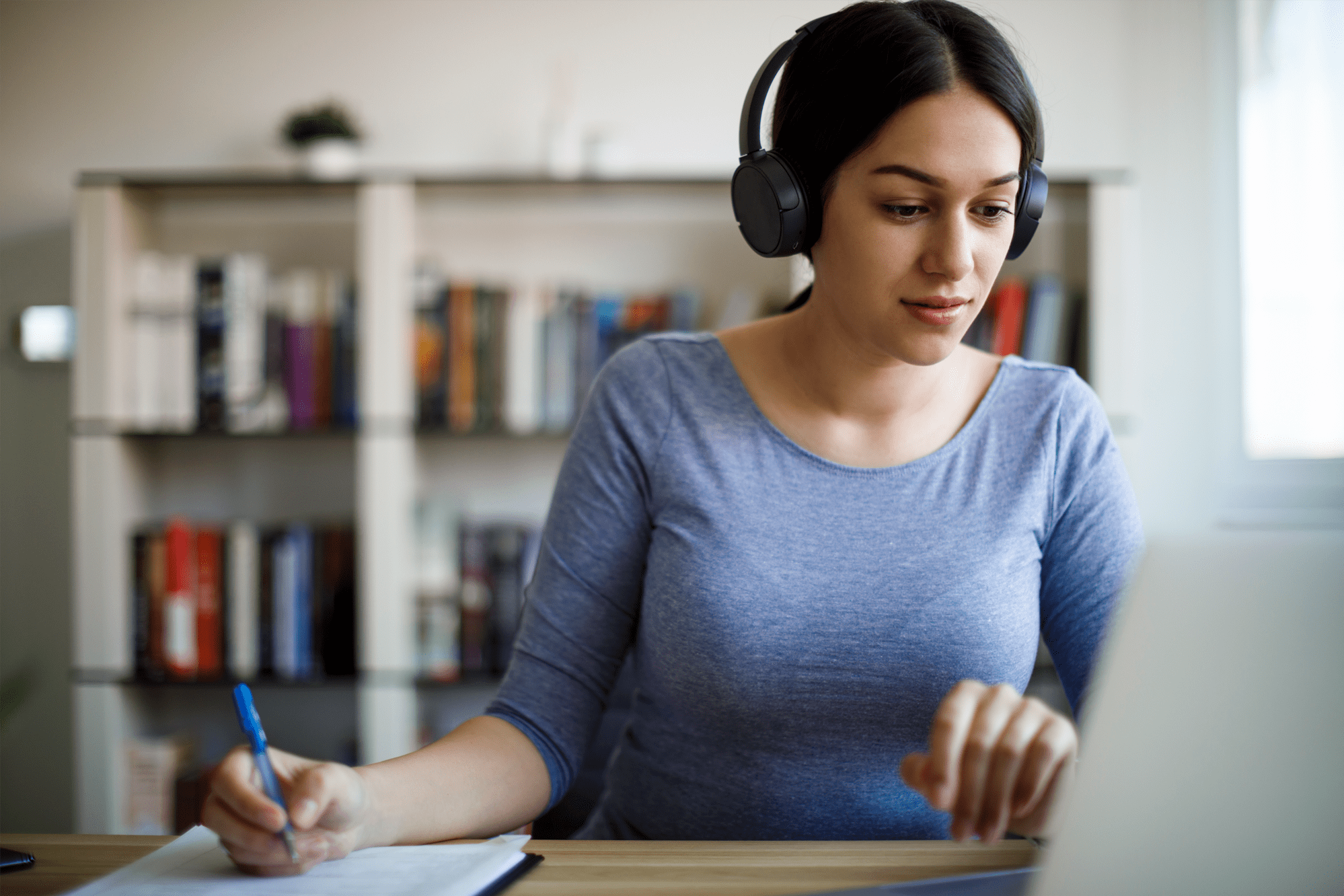Young female working at home office