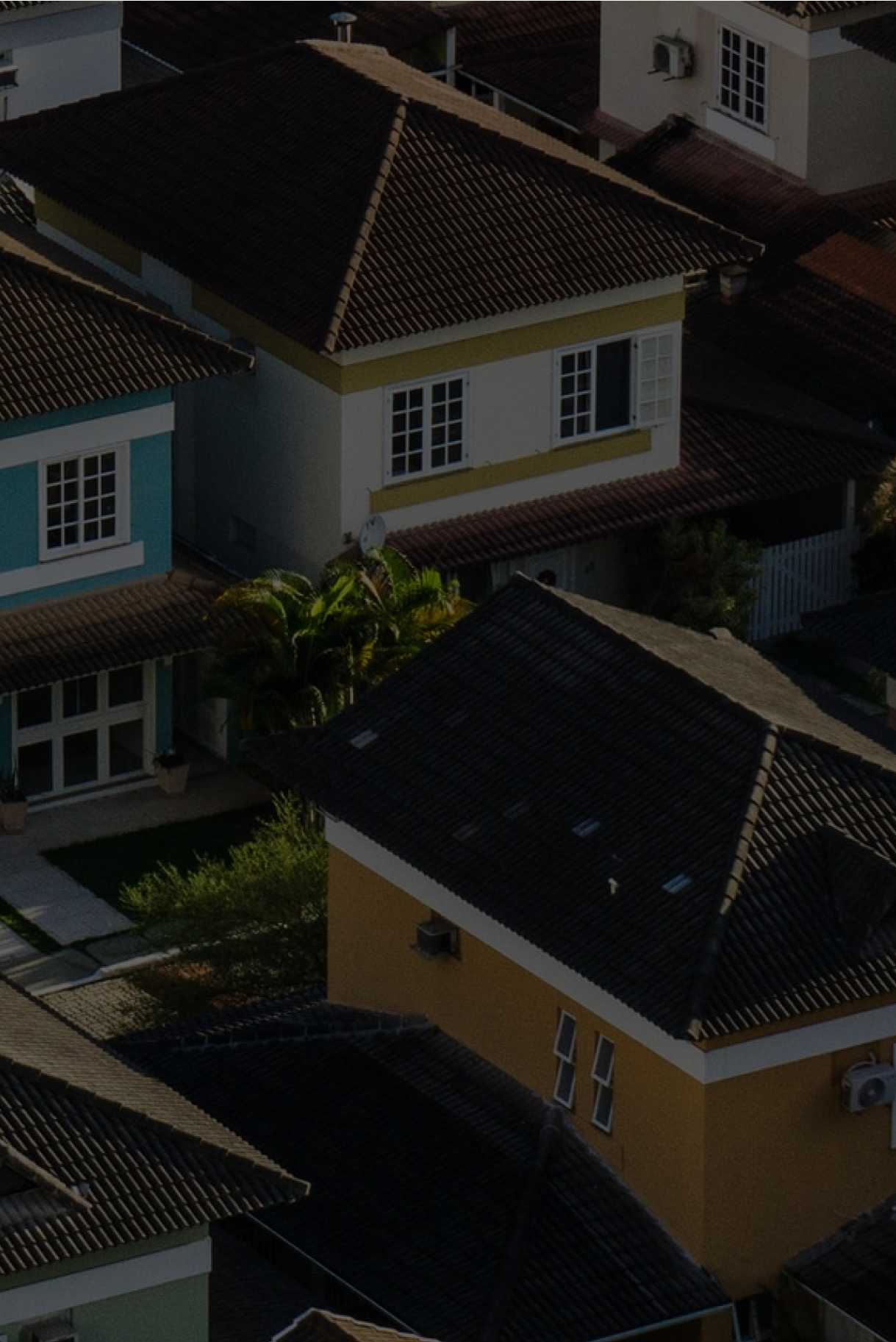 Aerial view of residential street with tall skinny homes with headline Get upgraded today