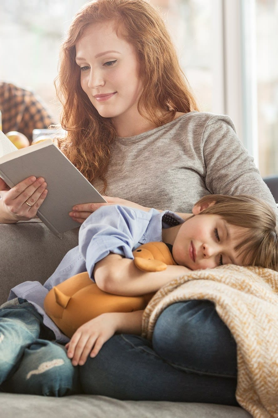 son-lying-on-mothers-laps-2x3