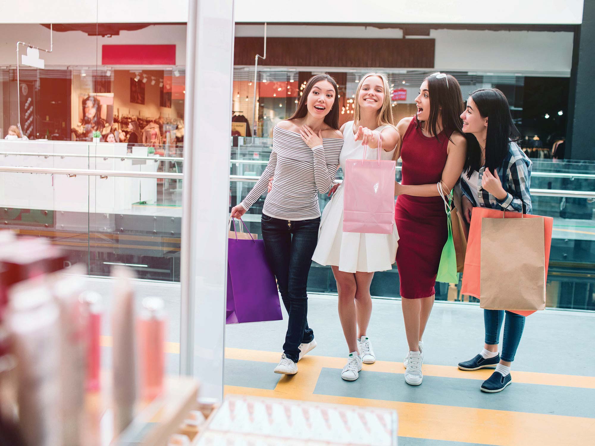 young-women-shopping-in-a-mall-c
