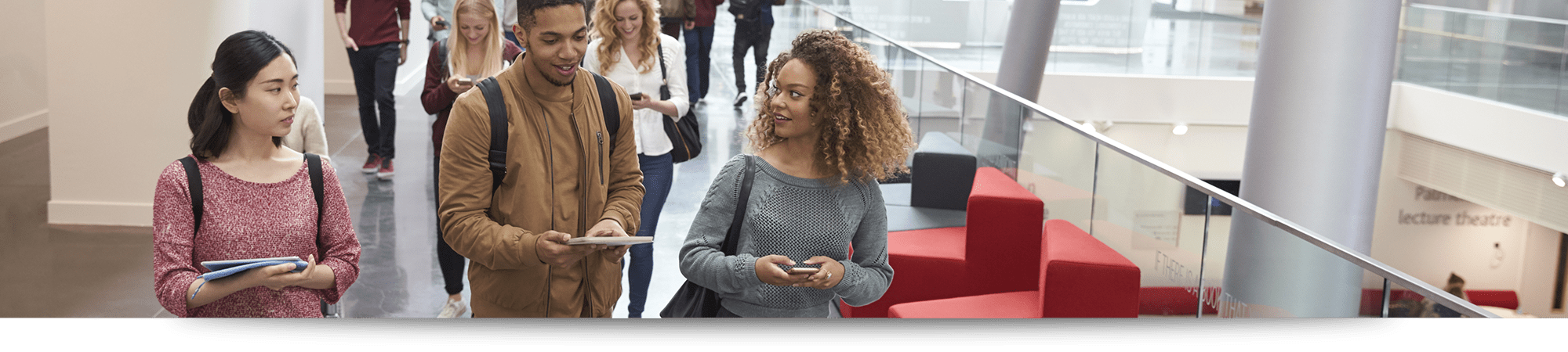 young-people-in-lobby-of-building-2000x400